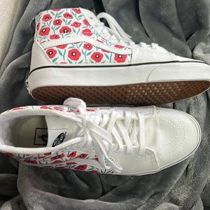 Red flower high top vans. Never worn.